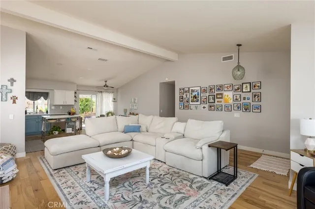 a living room with furniture and a table