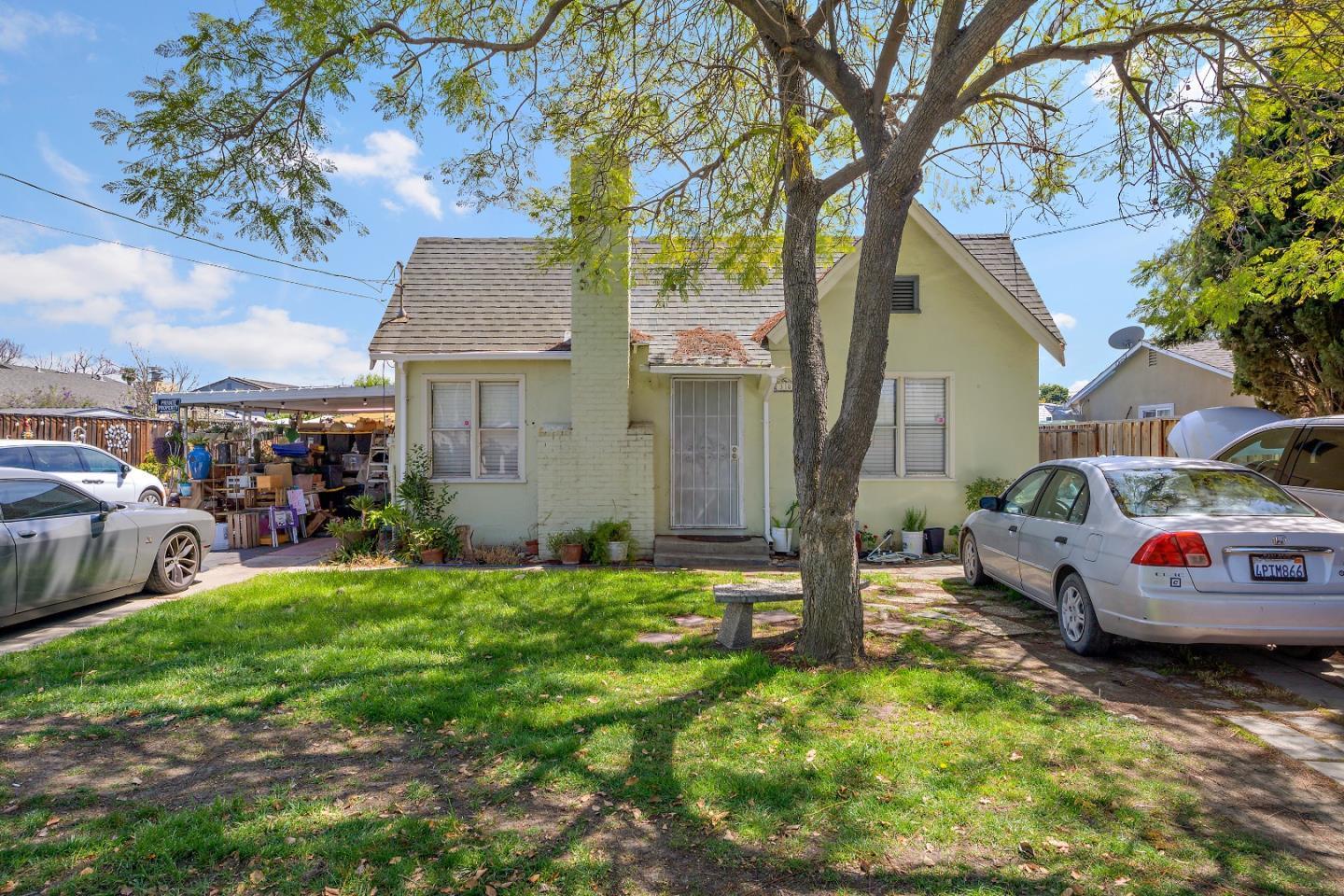 310 Lewis Road San Jose, CA 95111 - Photo 1 of 27 a front view of a house with garden