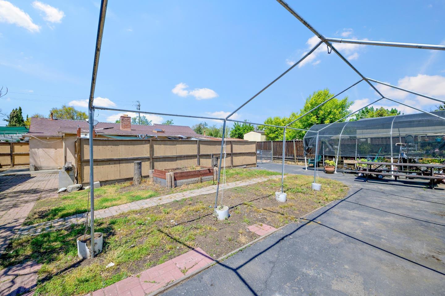 310 Lewis Road San Jose, CA 95111 - Photo 15 of 27 a view of a swimming pool with a patio