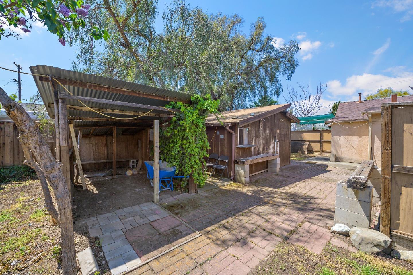 310 Lewis Road San Jose, CA 95111 - Photo 16 of 27 a view of a house with backyard porch and sitting area
