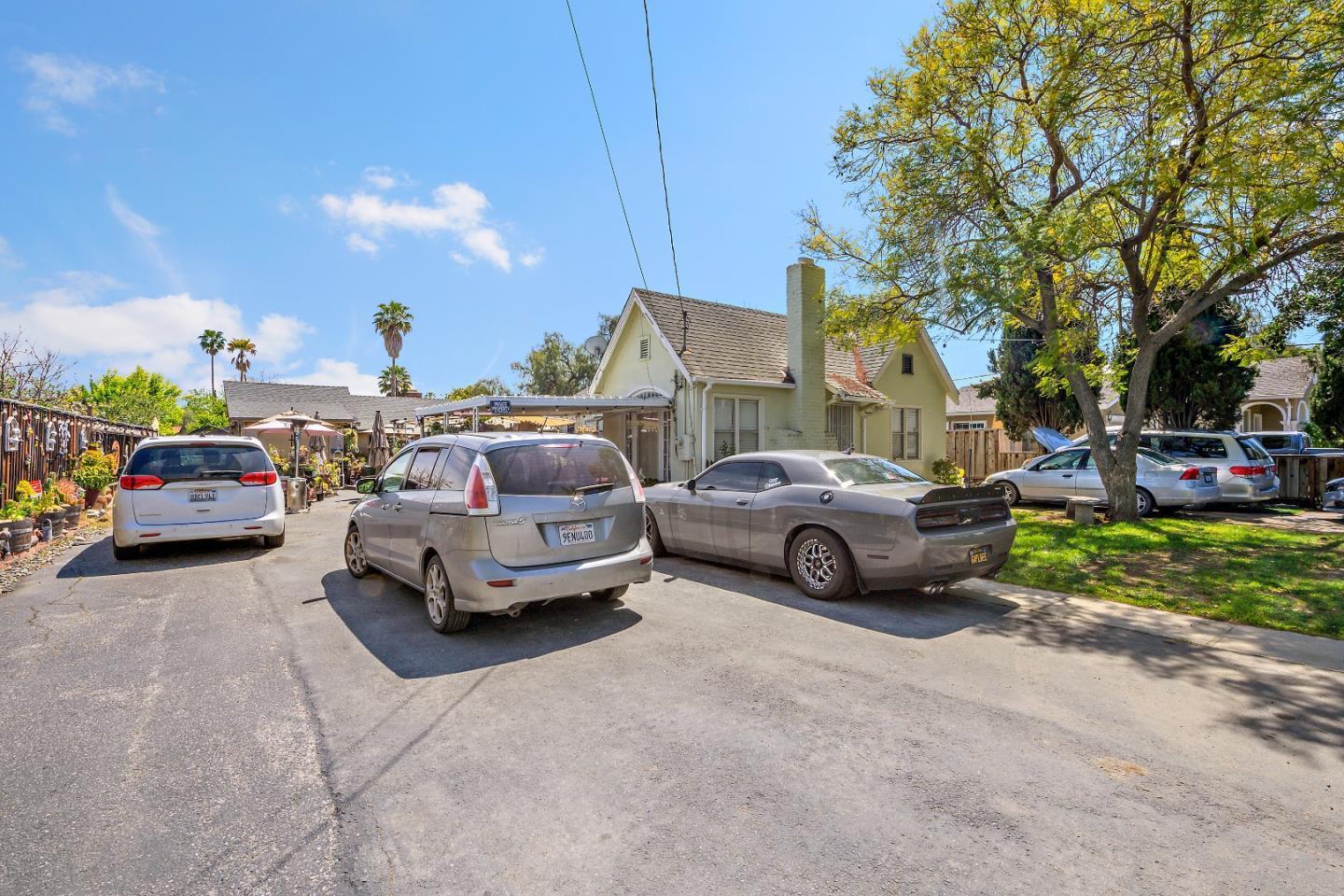 310 Lewis Road San Jose, CA 95111 - Photo 2 of 27 a view of cars parked in a parking lot