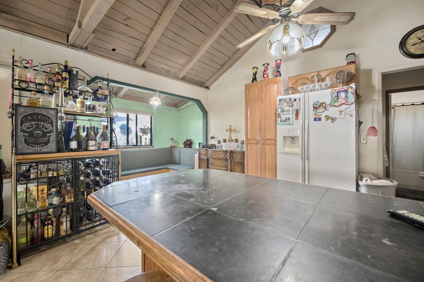 310 Lewis Road San Jose, CA 95111 - Photo 8 of 27 a view of a hallway with a dining table chairs and chandelier