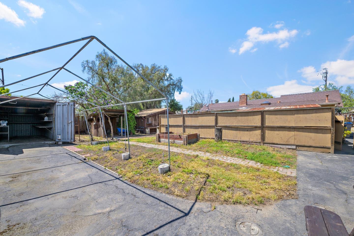 310 Lewis Road San Jose, CA 95111 - Photo 10 of 27 a view of a backyard