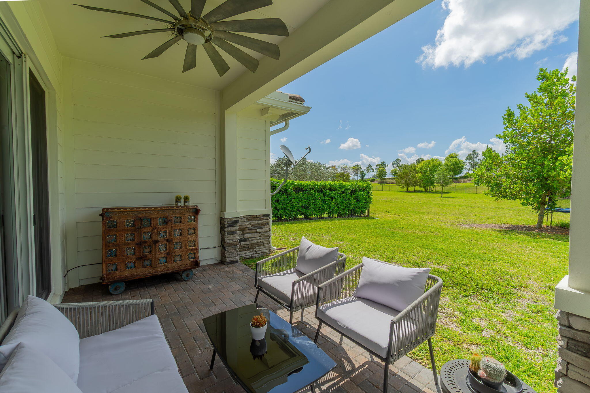 19546 Weathervane Way Loxahatchee, FL 33470 - Photo 33 of 63 a view of a chairs and table in the patio