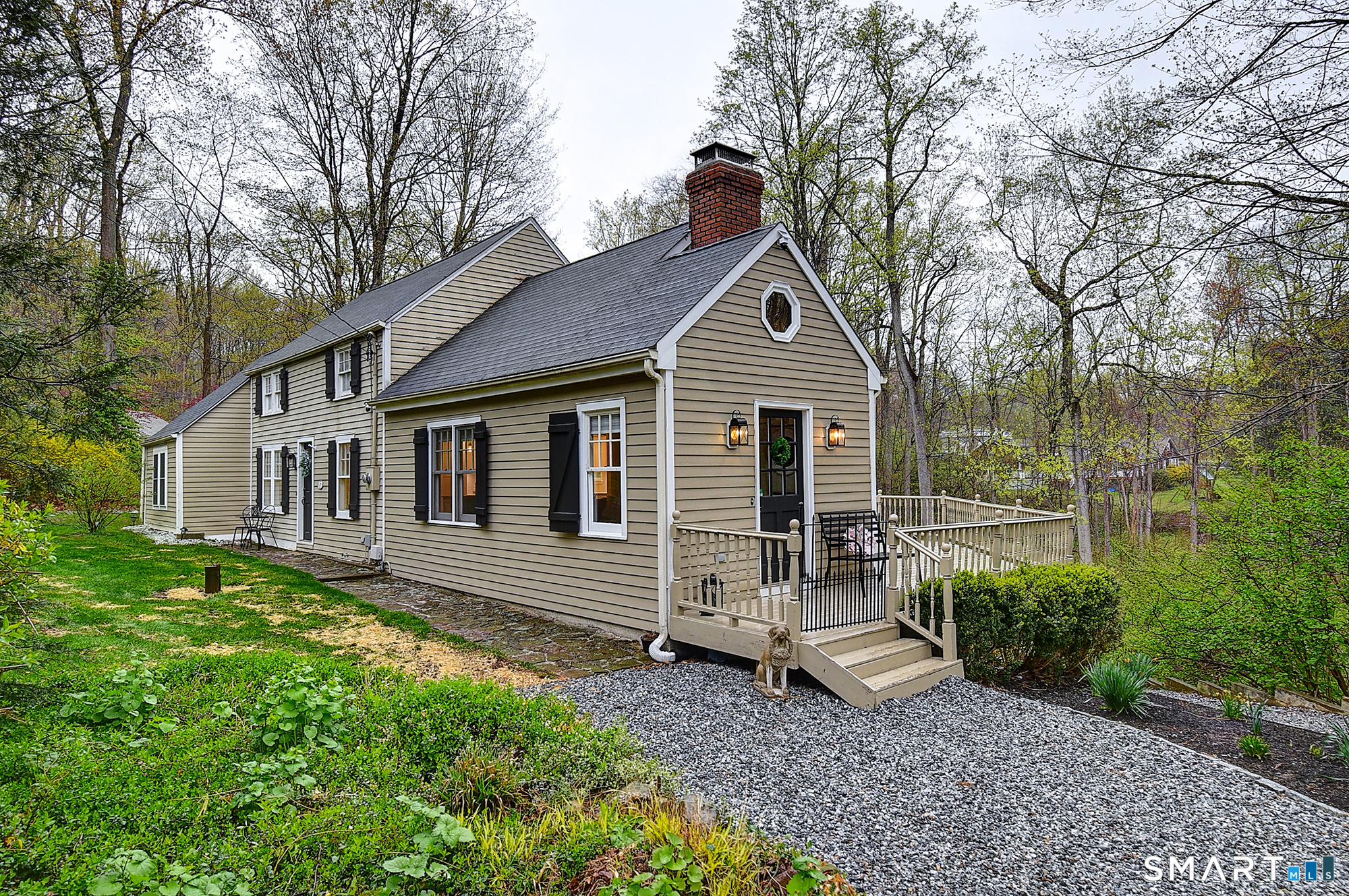 27 Chestnut Hill Road Newtown, CT 06482 - Photo 1 of 36 a view of a house with a yard