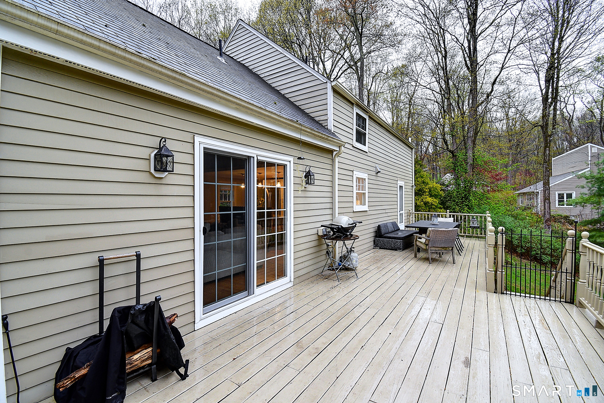 27 Chestnut Hill Road Newtown, CT 06482 - Photo 12 of 36 a view of backyard with a deck and wooden floor