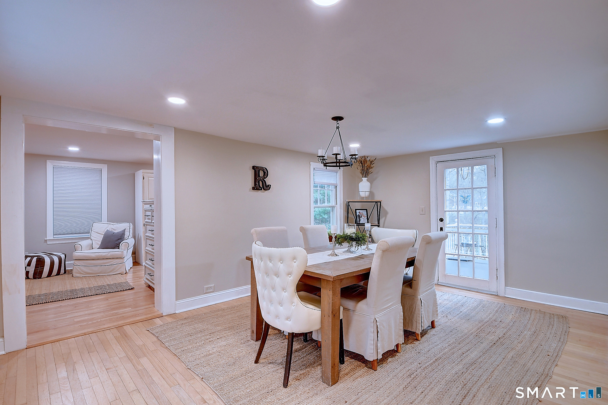 27 Chestnut Hill Road Newtown, CT 06482 - Photo 22 of 36 a view of a dining room with furniture and wooden floor