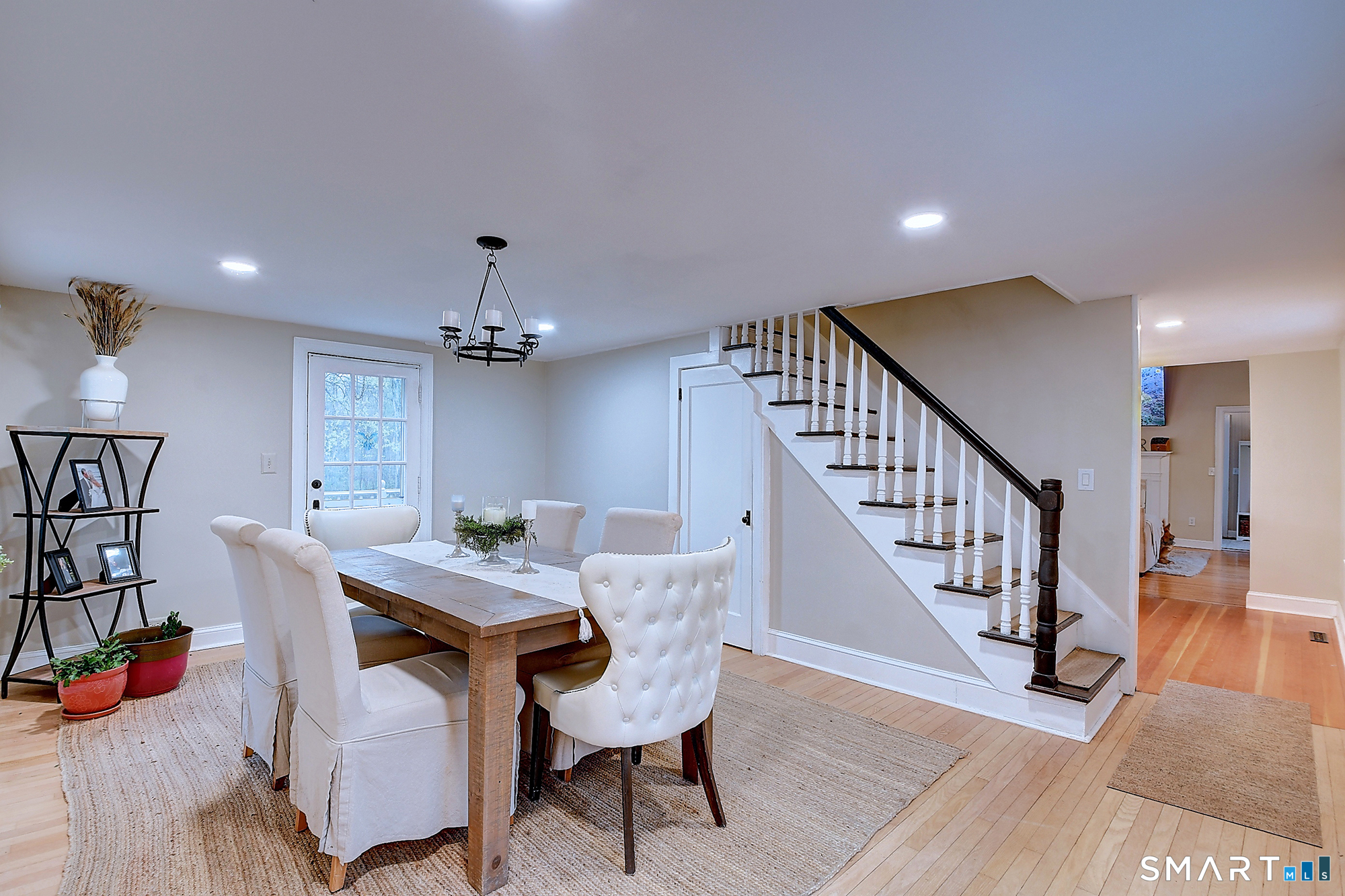 27 Chestnut Hill Road Newtown, CT 06482 - Photo 25 of 36 a view of a dining room with furniture and wooden floor