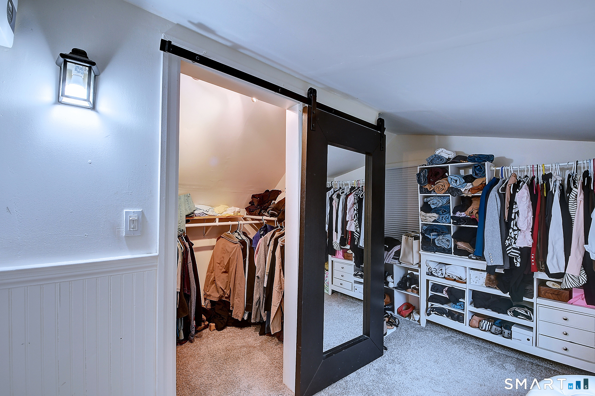 27 Chestnut Hill Road Newtown, CT 06482 - Photo 30 of 36 a view of walk in closet with clothes and shoes