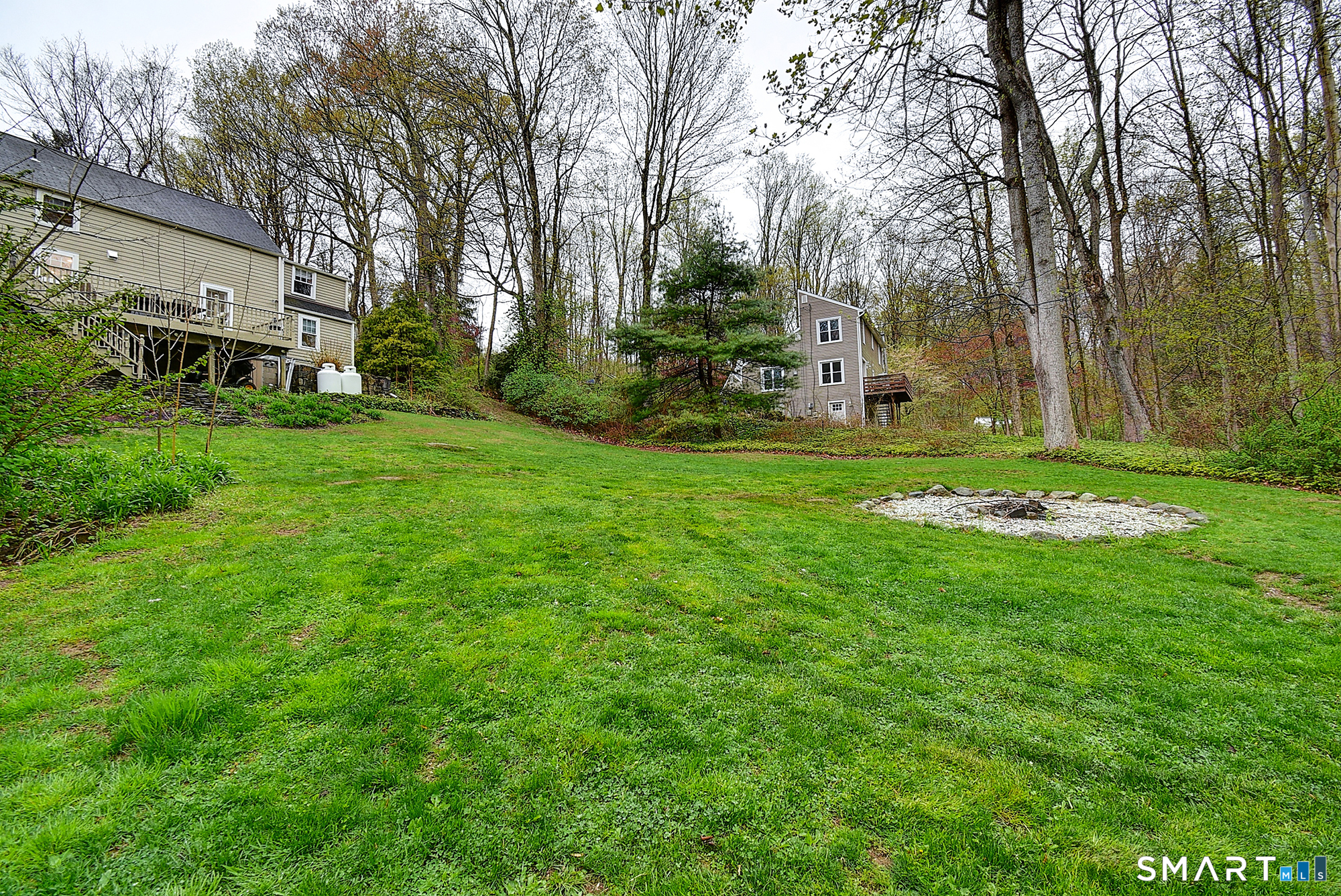 27 Chestnut Hill Road Newtown, CT 06482 - Photo 8 of 36 a view of a park with large trees