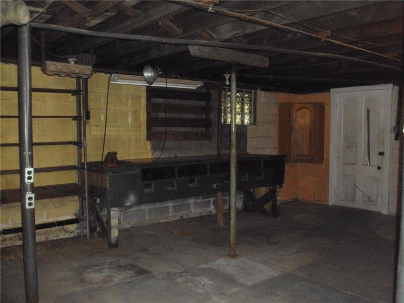 35 Hewitt Road West Middlesex, PA 16159 - Photo 22 of 25 another part of the basement, showing walk out door.