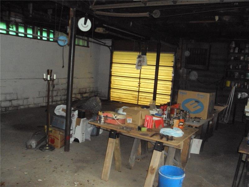 35 Hewitt Road West Middlesex, PA 16159 - Photo 23 of 25 View from back overhead door of 2nd garage. large space