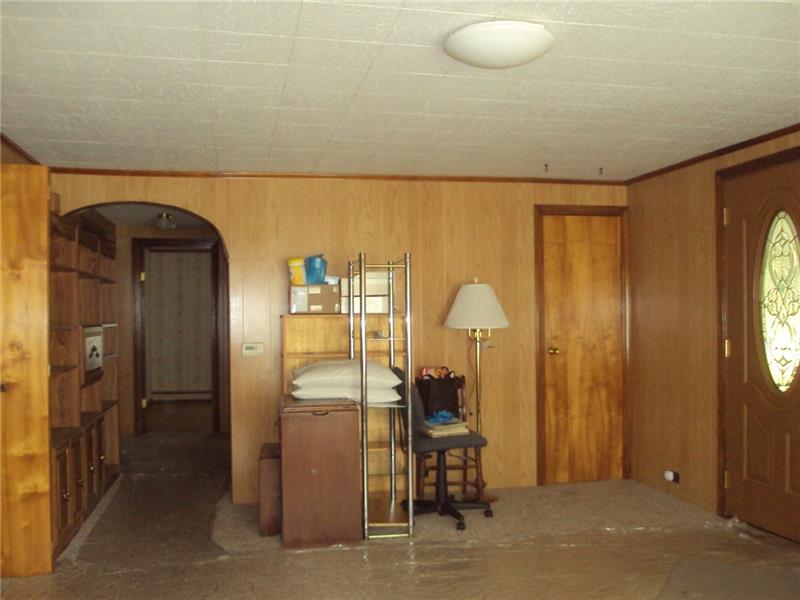 35 Hewitt Road West Middlesex, PA 16159 - Photo 7 of 25 Another view of the living room (the bookcases on the left are leaving)