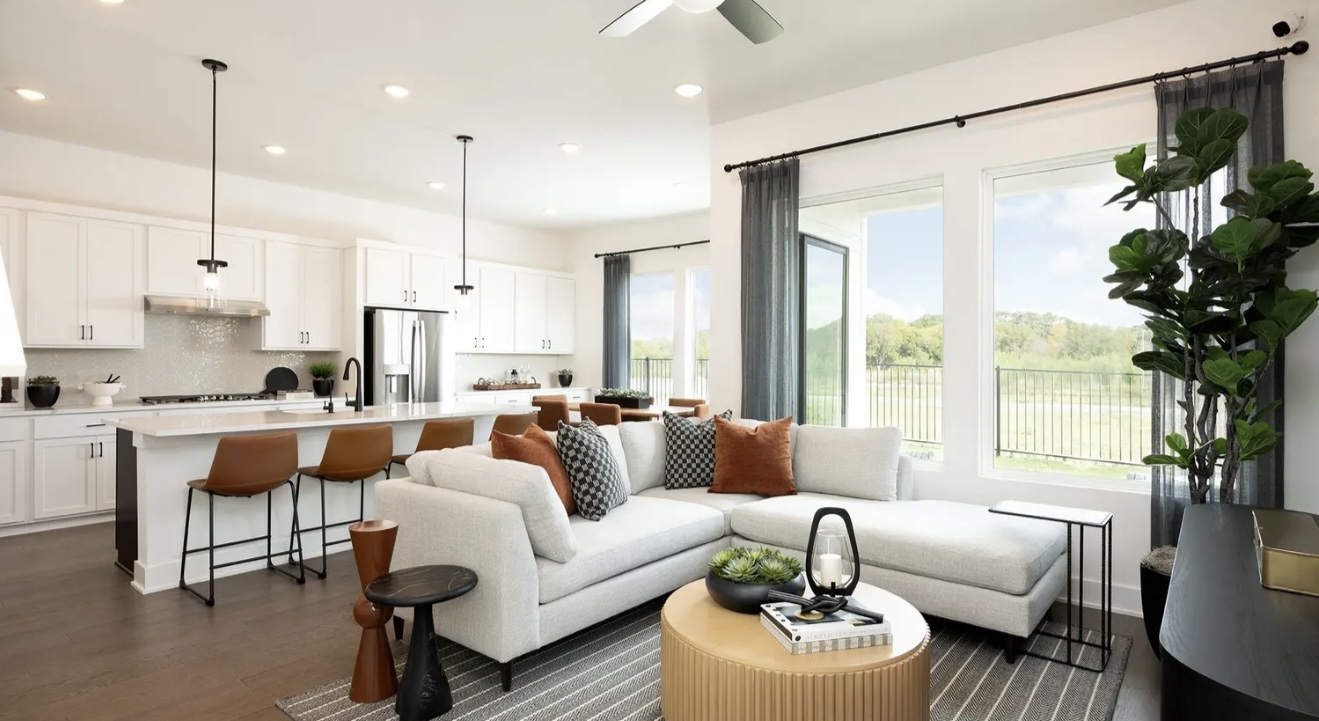 1405 Sweet Bark Street Austin, TX 78745 - Photo 3 of 11 a living room with furniture kitchen view and large windows