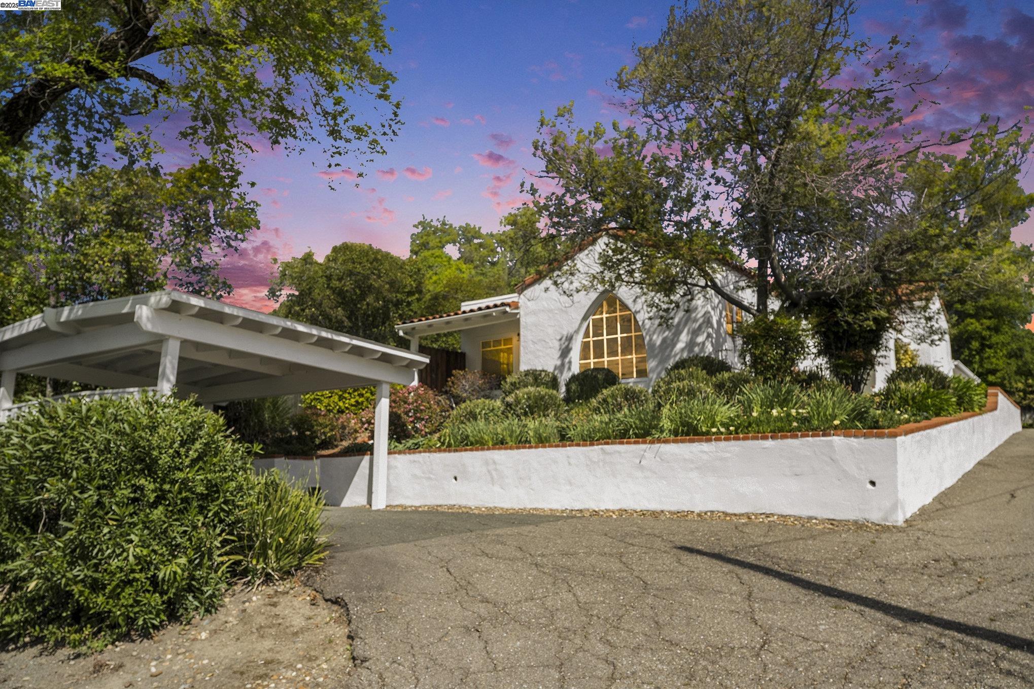 366 Ilo Lane Danville, CA 94526 - Photo 1 of 36 a view of a house with a small yard and a large tree
