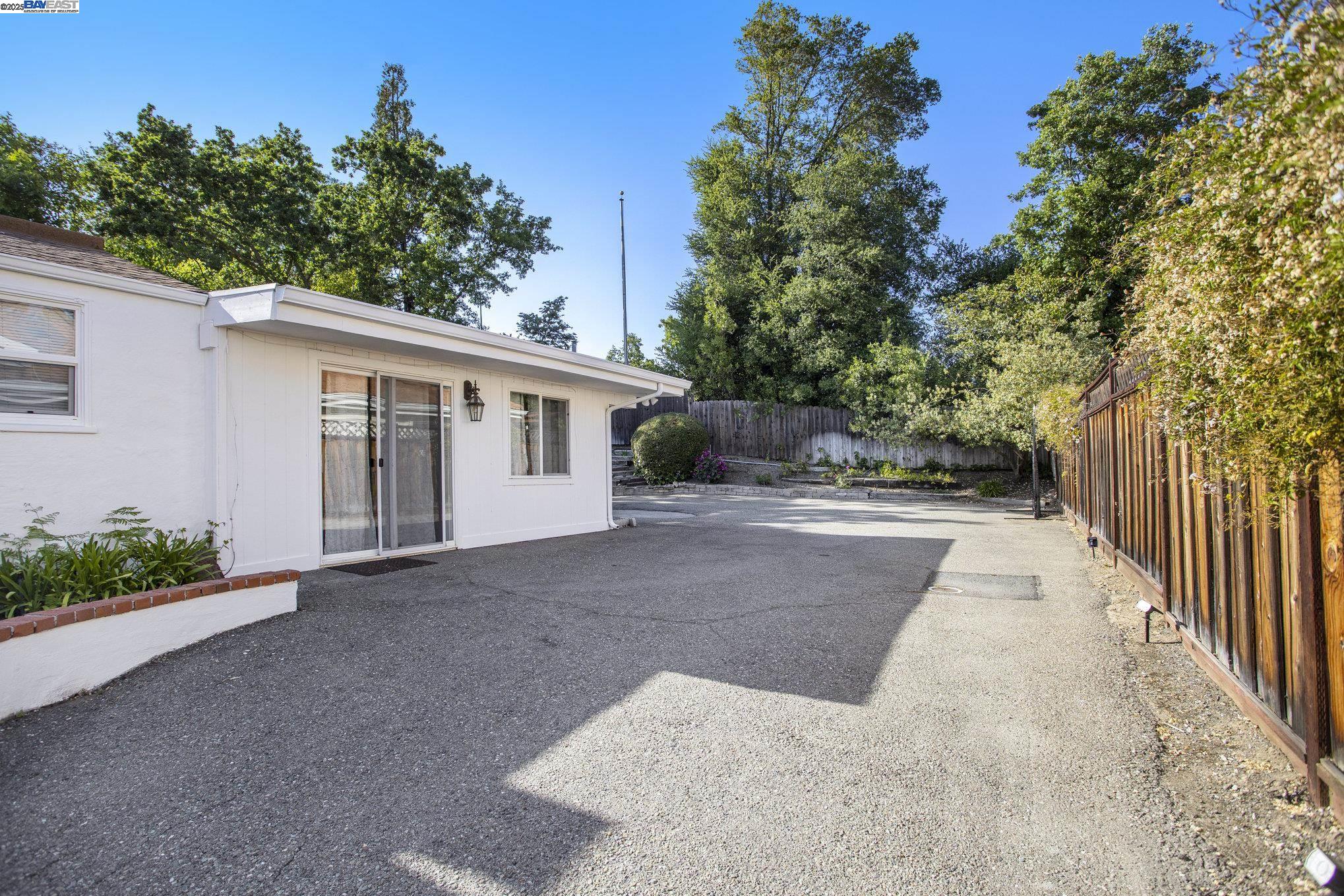366 Ilo Lane Danville, CA 94526 - Photo 22 of 36 a view of a house with backyard and trees