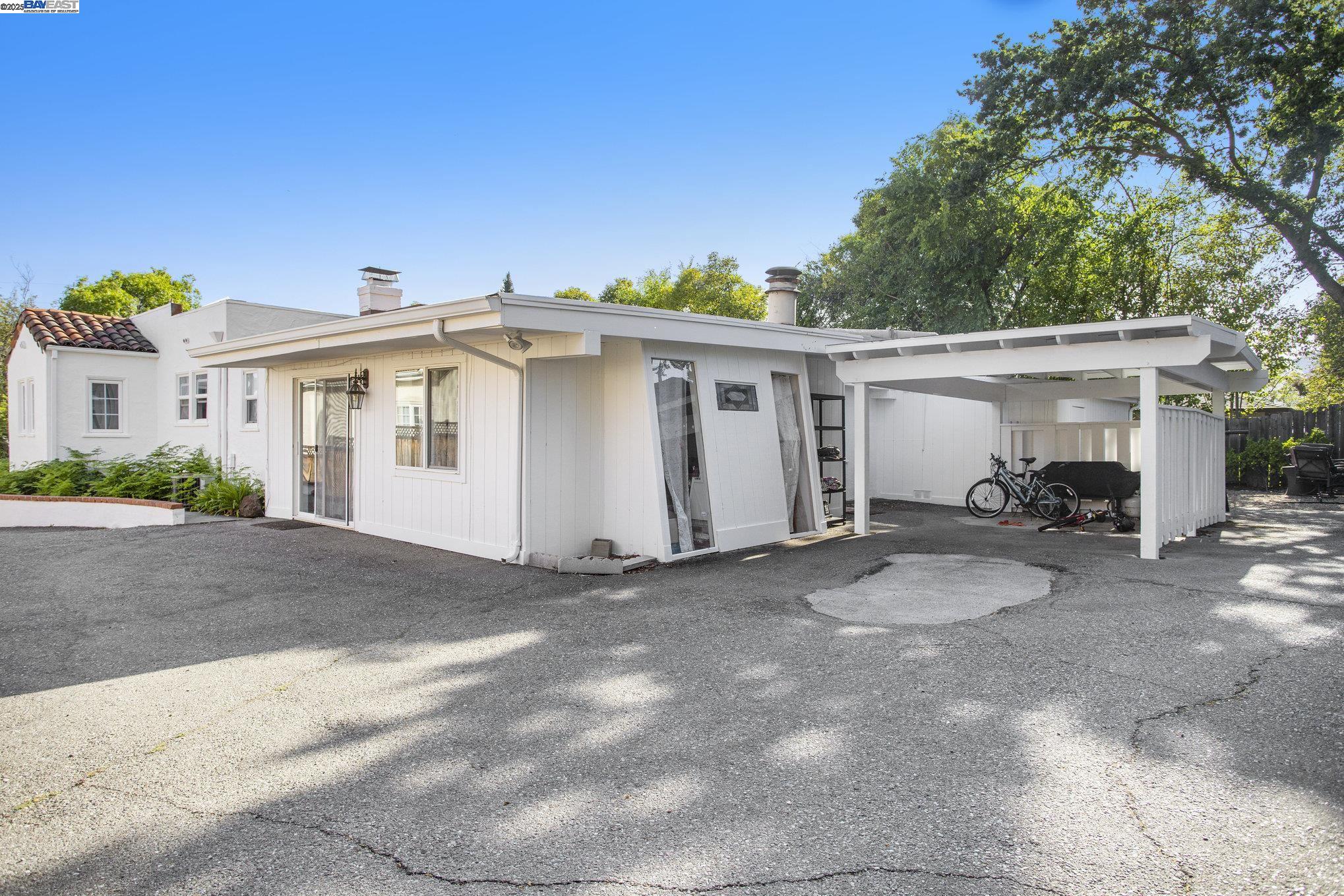 366 Ilo Lane Danville, CA 94526 - Photo 25 of 36 a view of a white house with a outdoor space and backyard