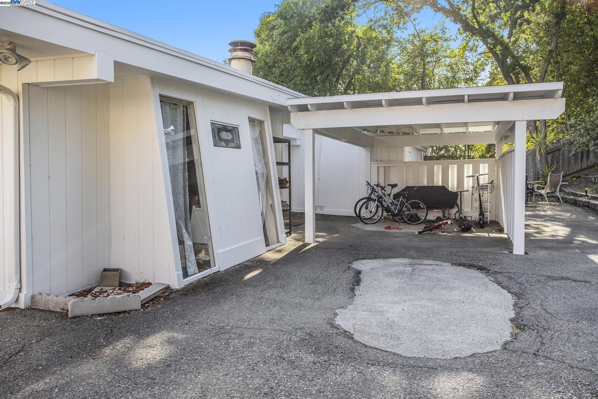366 Ilo Lane Danville, CA 94526 - Photo 26 of 36 a view of a patio with table and chairs a barbeque