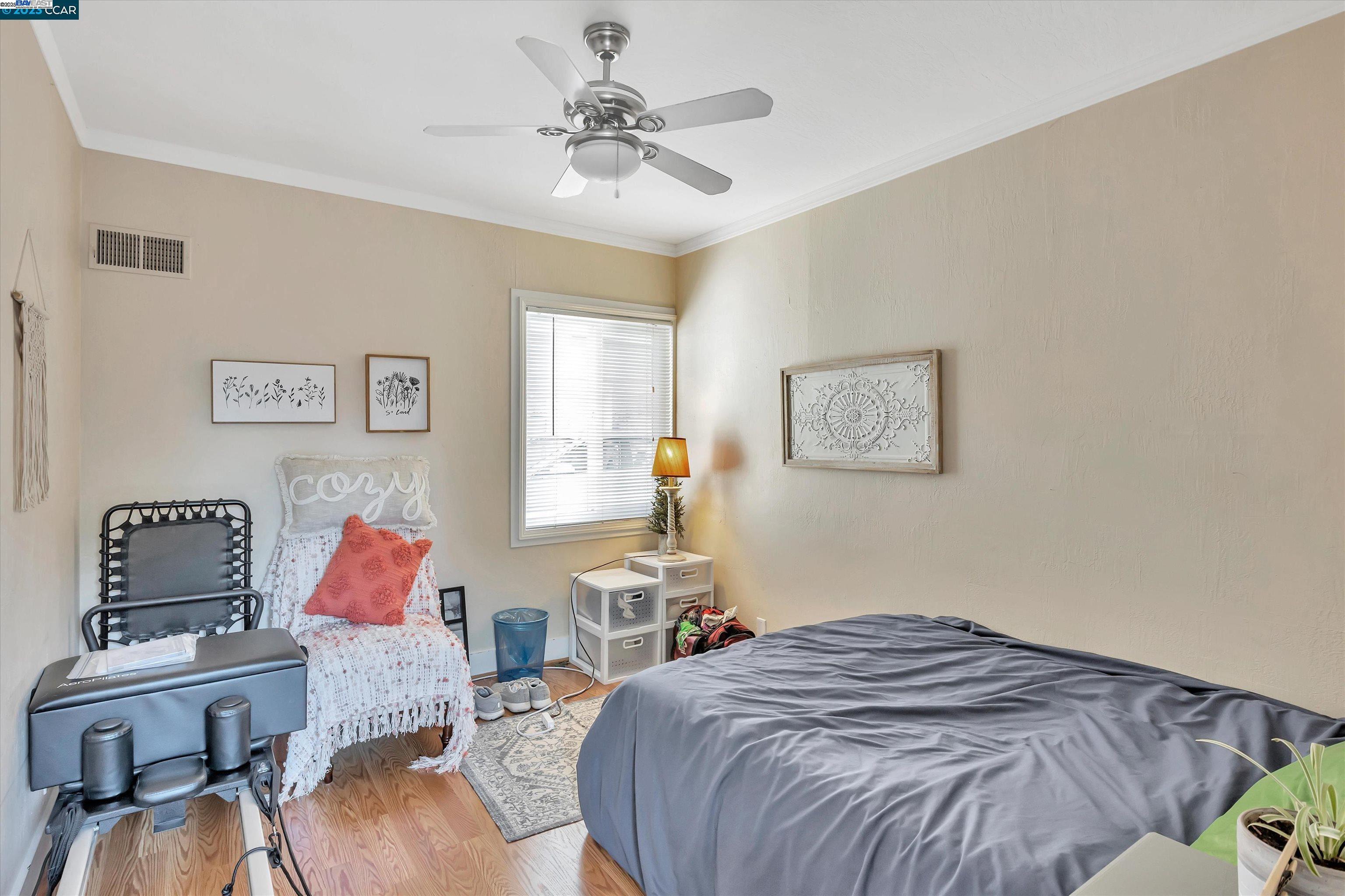 366 Ilo Lane Danville, CA 94526 - Photo 33 of 36 a bedroom with a bed and a chandelier