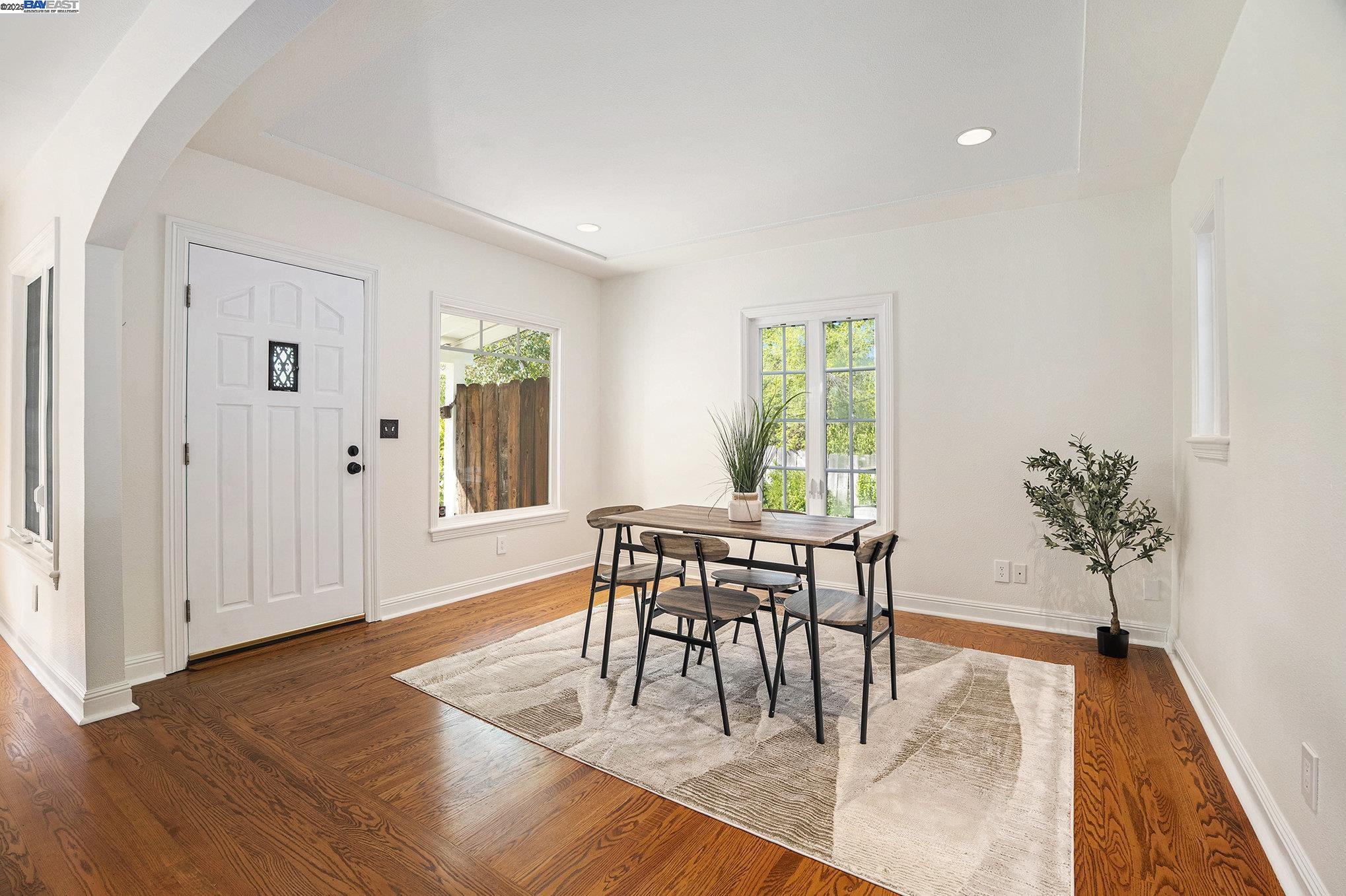 366 Ilo Lane Danville, CA 94526 - Photo 7 of 36 a view of a dining room with furniture and wooden floor