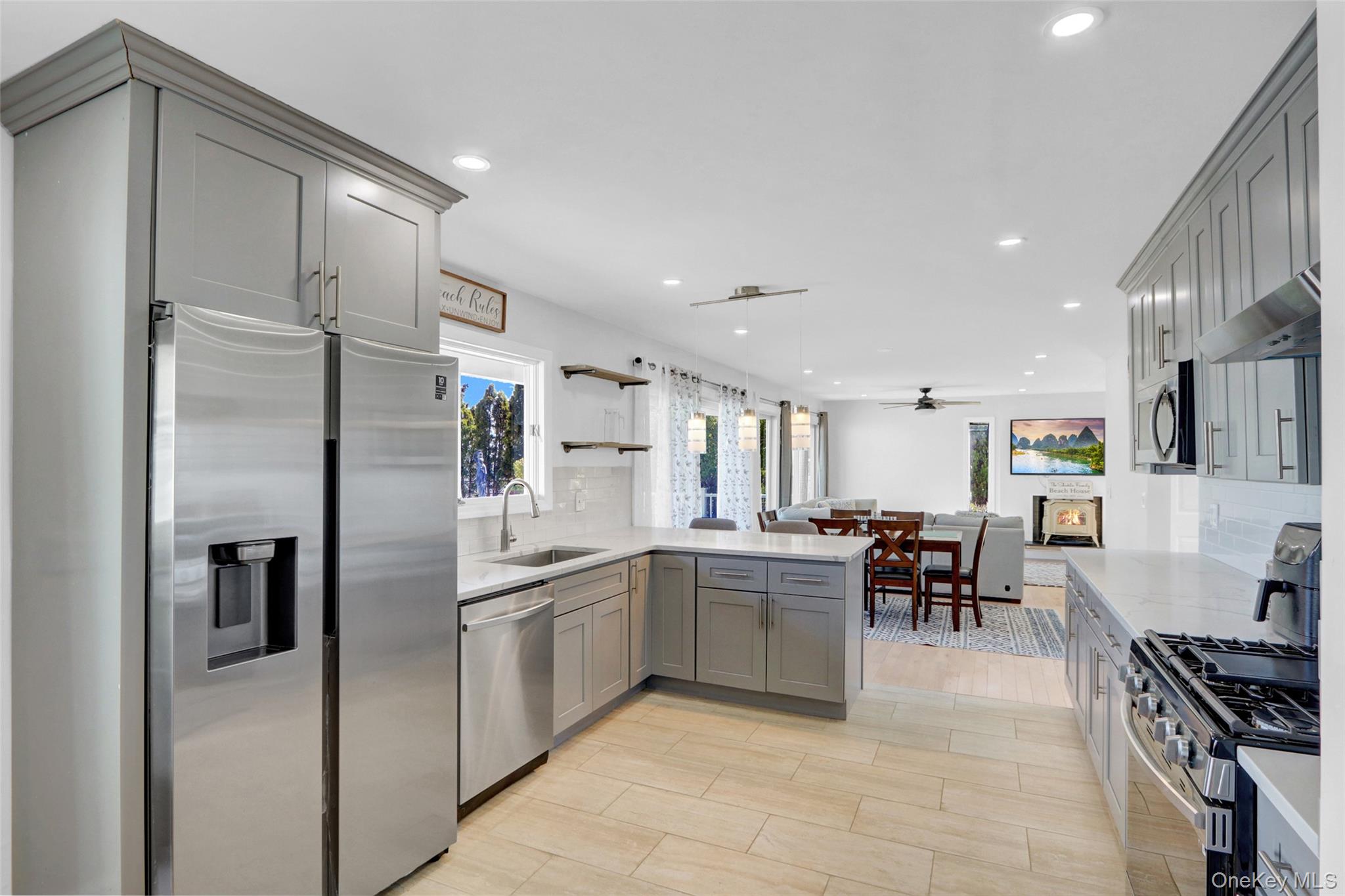 25 Wildwood Road Rocky Point, NY 11778 - Photo 19 of 47 a kitchen with appliances cabinets and furniture