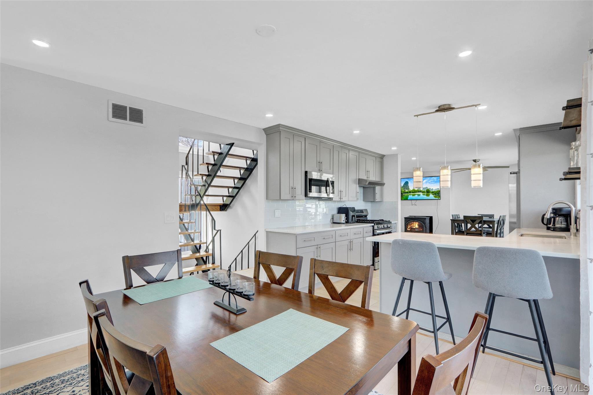 25 Wildwood Road Rocky Point, NY 11778 - Photo 22 of 47 a view of a dining room with furniture and a table