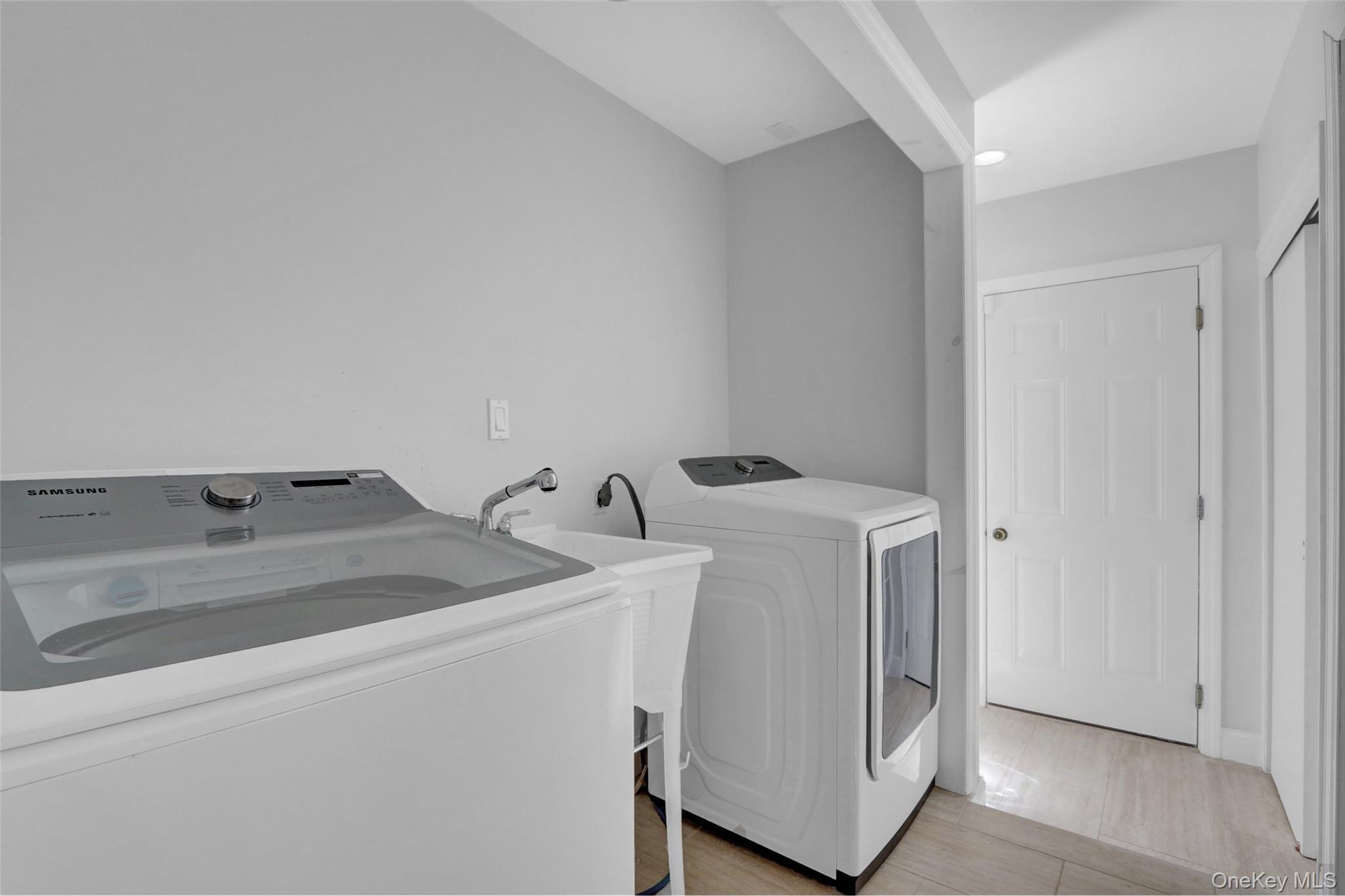 25 Wildwood Road Rocky Point, NY 11778 - Photo 27 of 47 a utility room with dryer and washer