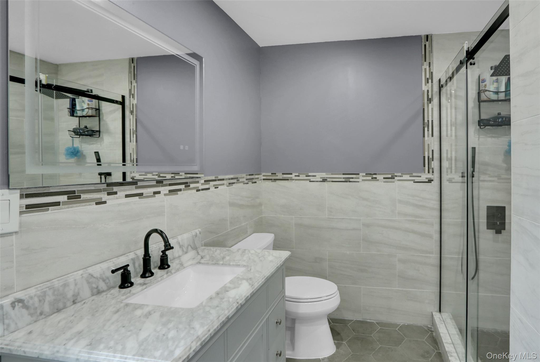 25 Wildwood Road Rocky Point, NY 11778 - Photo 39 of 47 a bathroom with a granite countertop sink toilet and shower