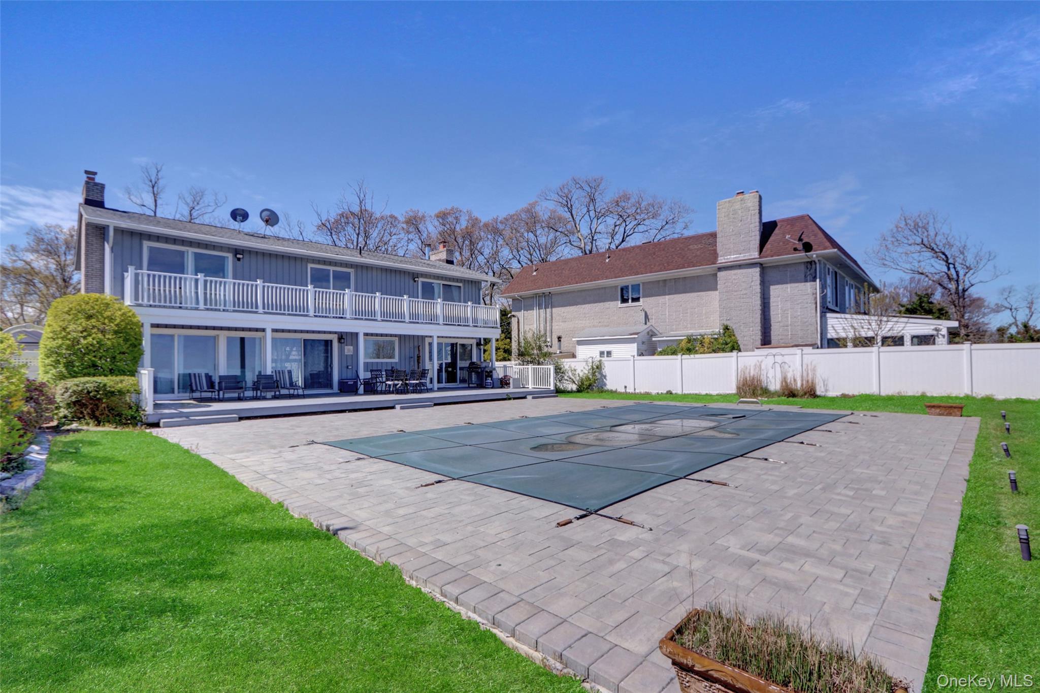 25 Wildwood Road Rocky Point, NY 11778 - Photo 7 of 47 a view of a big building with a big yard and large tree