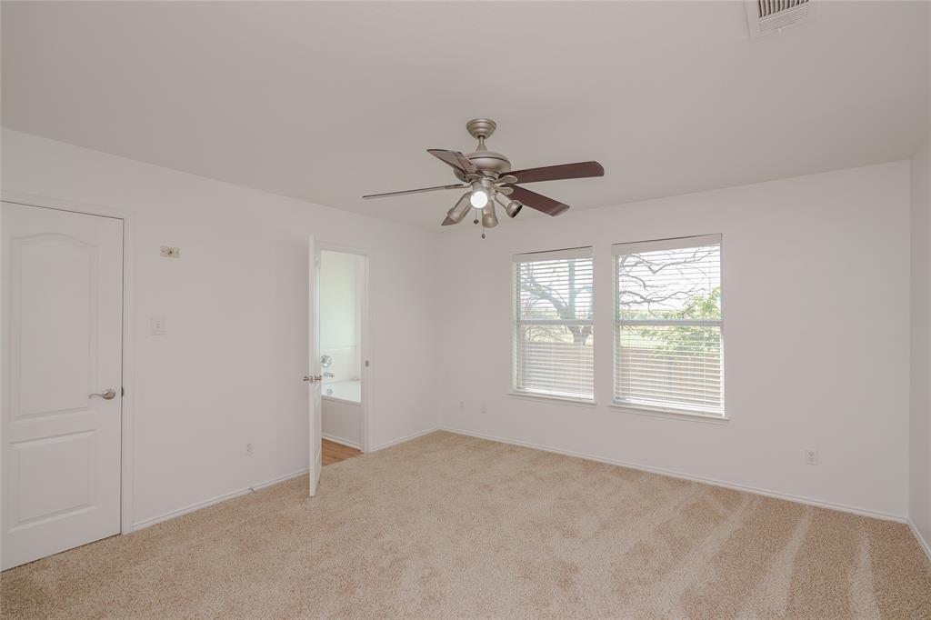 2912 Lighthouse Drive Denton, TX 76210 - Photo 20 of 34 a view of an empty room with a window