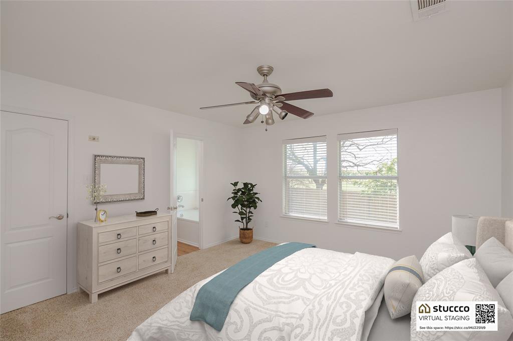 2912 Lighthouse Drive Denton, TX 76210 - Photo 21 of 34 a bedroom with a bed and a window