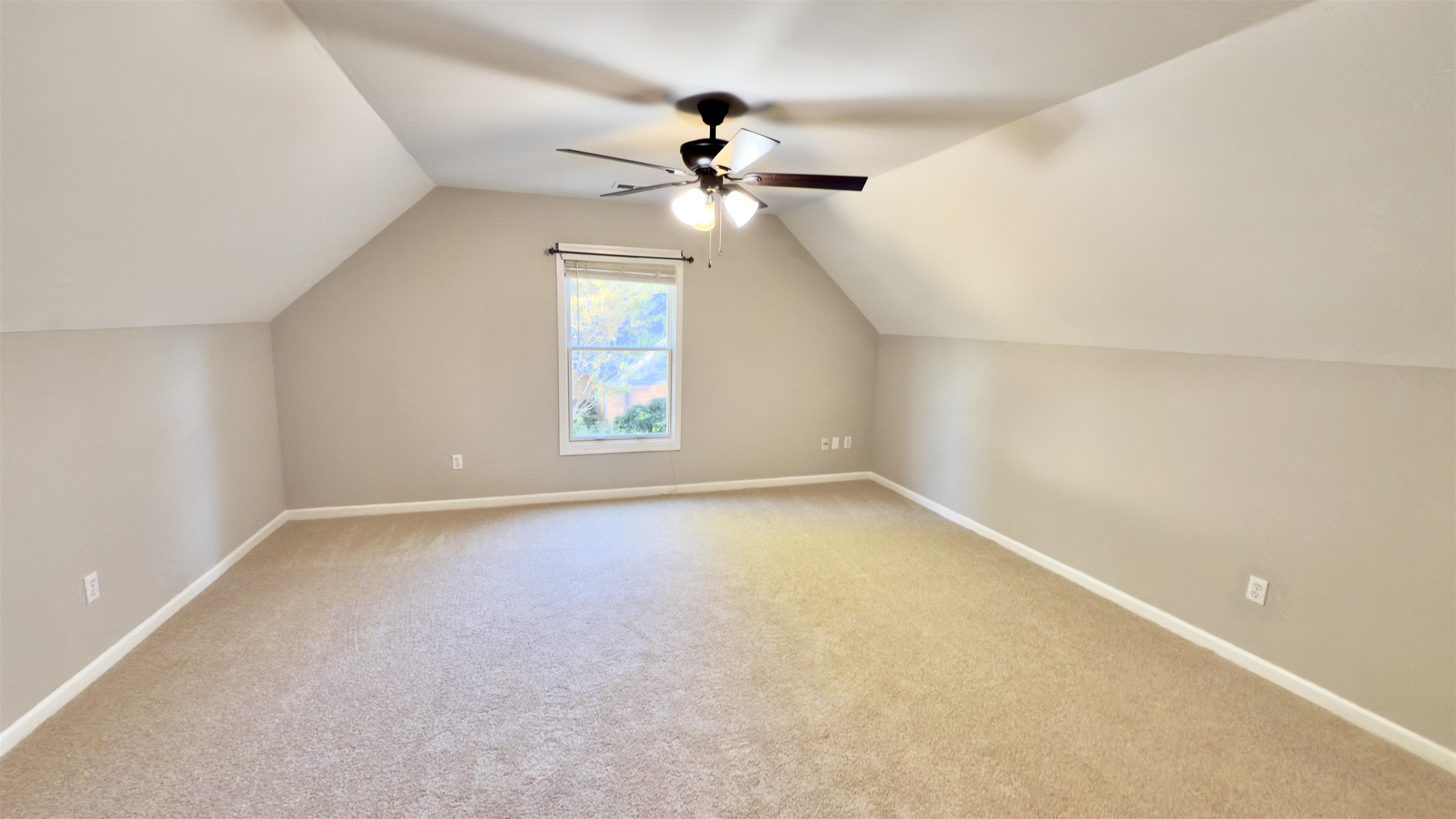 623 Winford Drive Collierville, TN 38017 - Photo 18 of 22 an empty room with a window and a ceiling fan