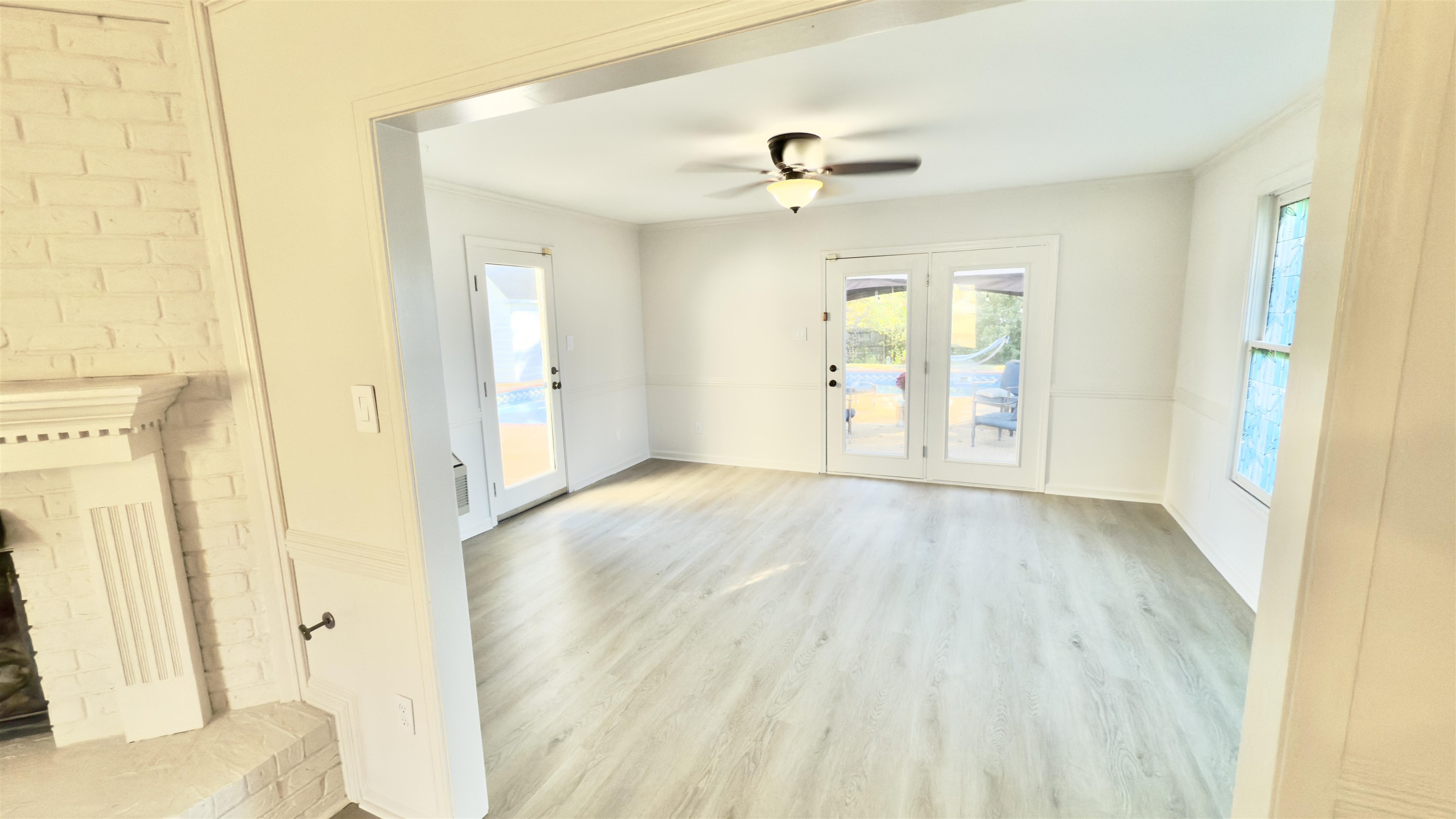 623 Winford Drive Collierville, TN 38017 - Photo 5 of 22 a view of an empty room with wooden floor