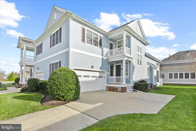 a view of multiple house with a yard