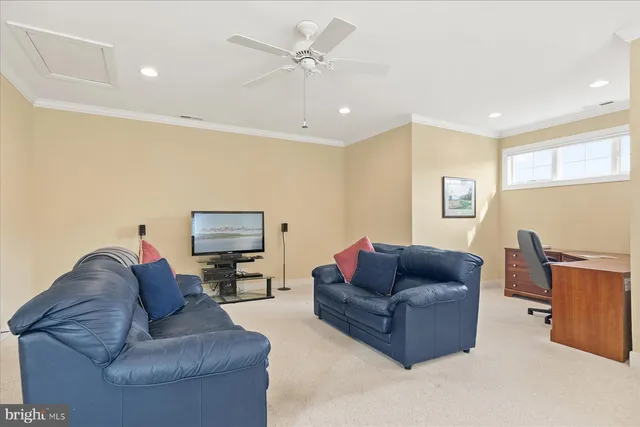 a living room with furniture and a couch