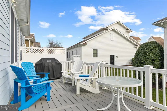 a view of a house with patio and wooden floor