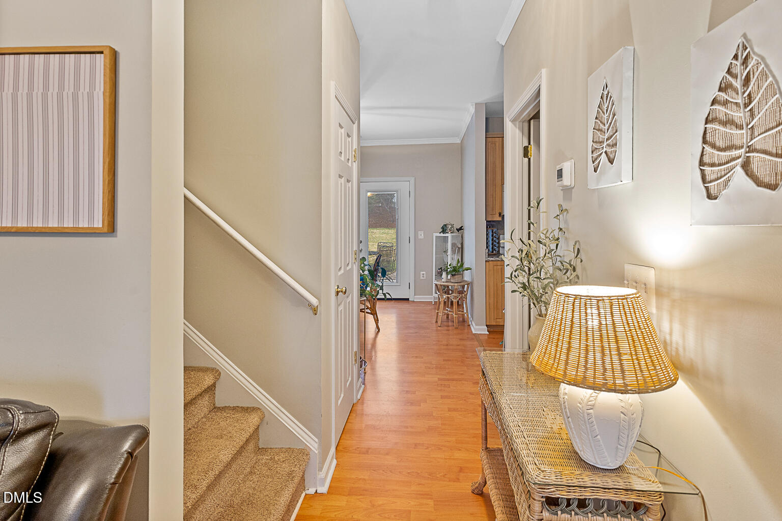 2907 Andover Glen Road Raleigh, NC 27604 - Photo 31 of 39 a hallway with wooden floor and furniture