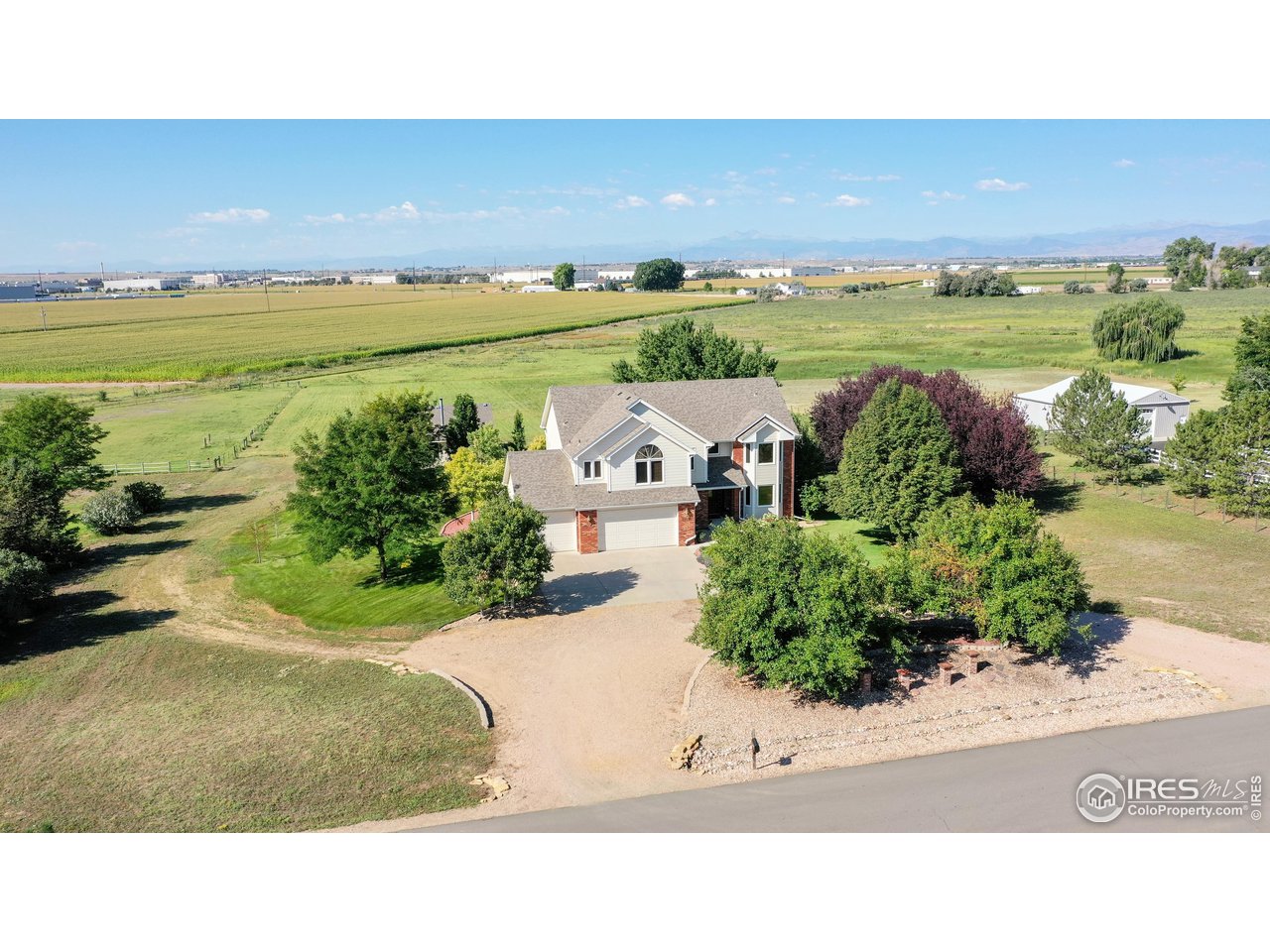 32593 Stagecoach Road Windsor, CO 80550 - Photo 12 of 28 a black and white photo of a city