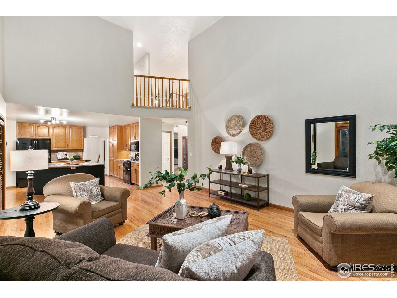 32593 Stagecoach Road Windsor, CO 80550 - Photo 2 of 28 a living room with furniture and a large window