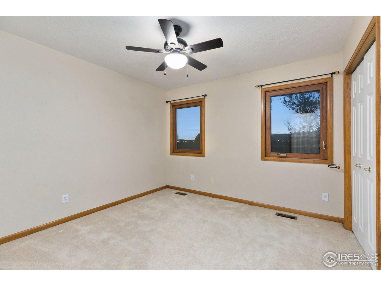 32593 Stagecoach Road Windsor, CO 80550 - Photo 23 of 28 a view of an empty room with window