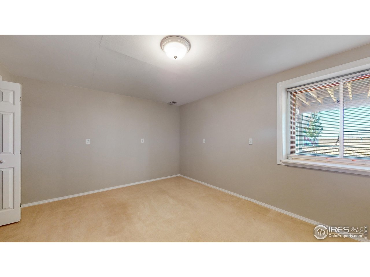 32593 Stagecoach Road Windsor, CO 80550 - Photo 27 of 28 a open hall with a window