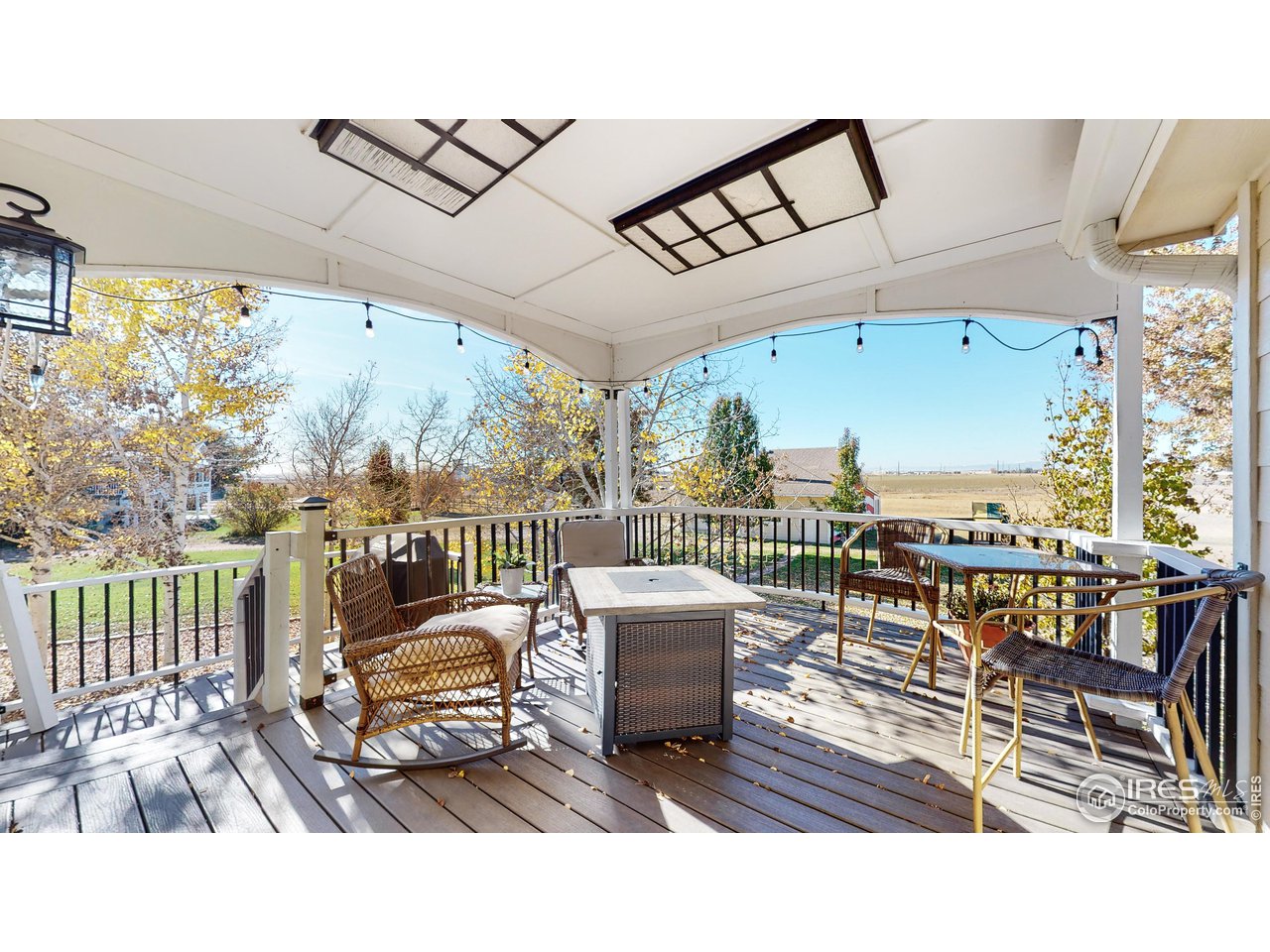 32593 Stagecoach Road Windsor, CO 80550 - Photo 7 of 28 a balcony with furniture