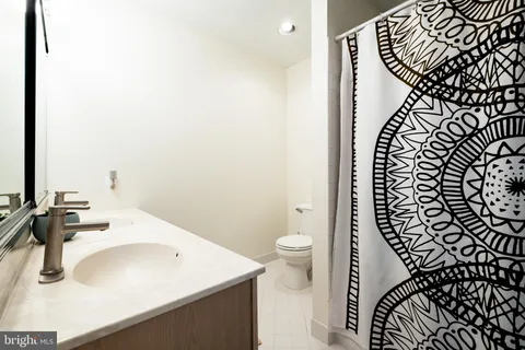 a bathroom with a sink and a toilet