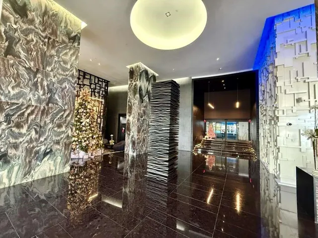 view of hall way with furniture