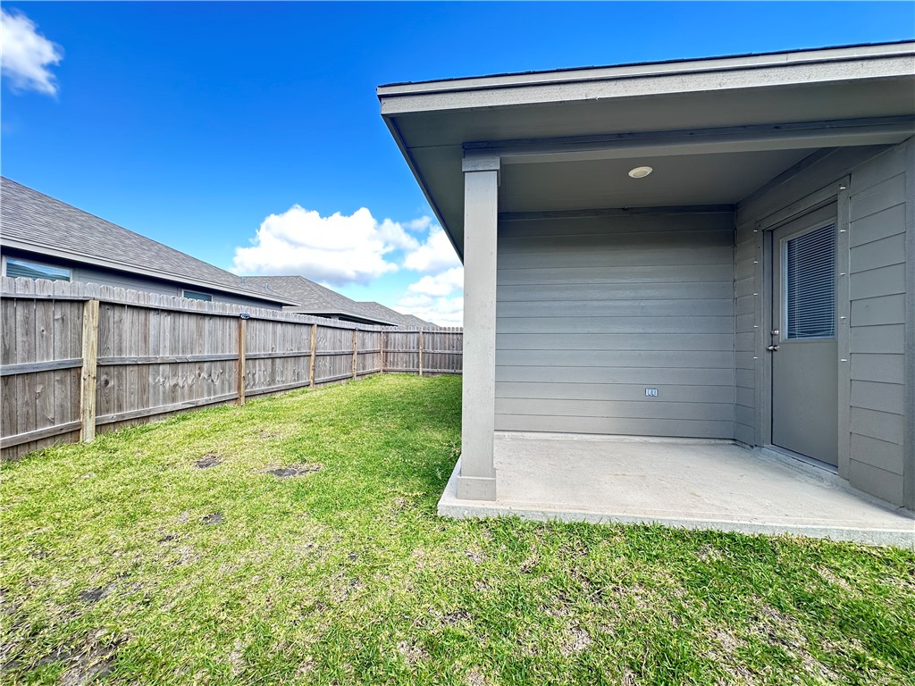 7649 Herd Rider Lane Corpus Christi, TX 78414 - Photo 6 of 18 a view of backyard with garden