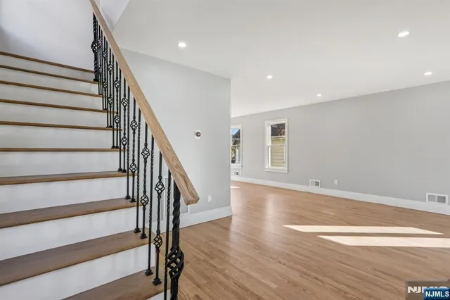 a view of entryway with wooden floor