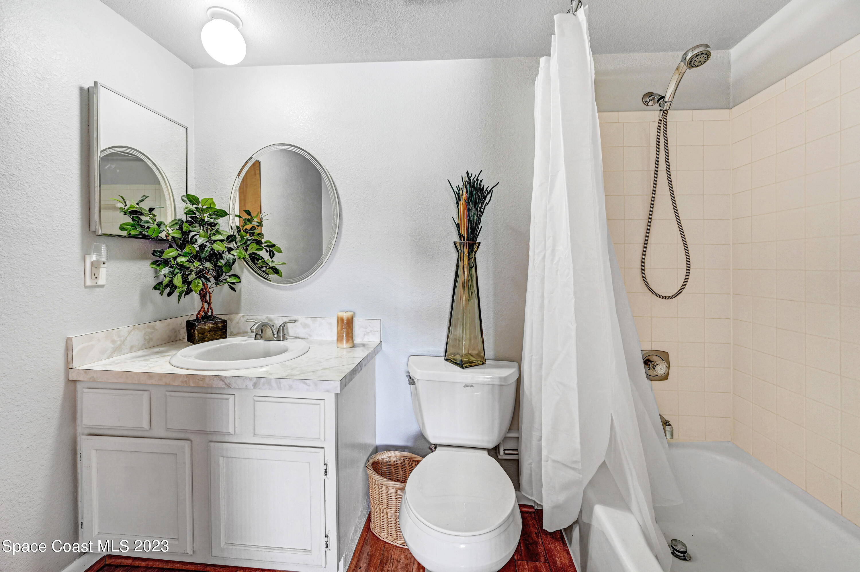 229 Augusta Way Melbourne, FL 32940 - Photo 29 of 39 a bathroom with a sink toilet and shower