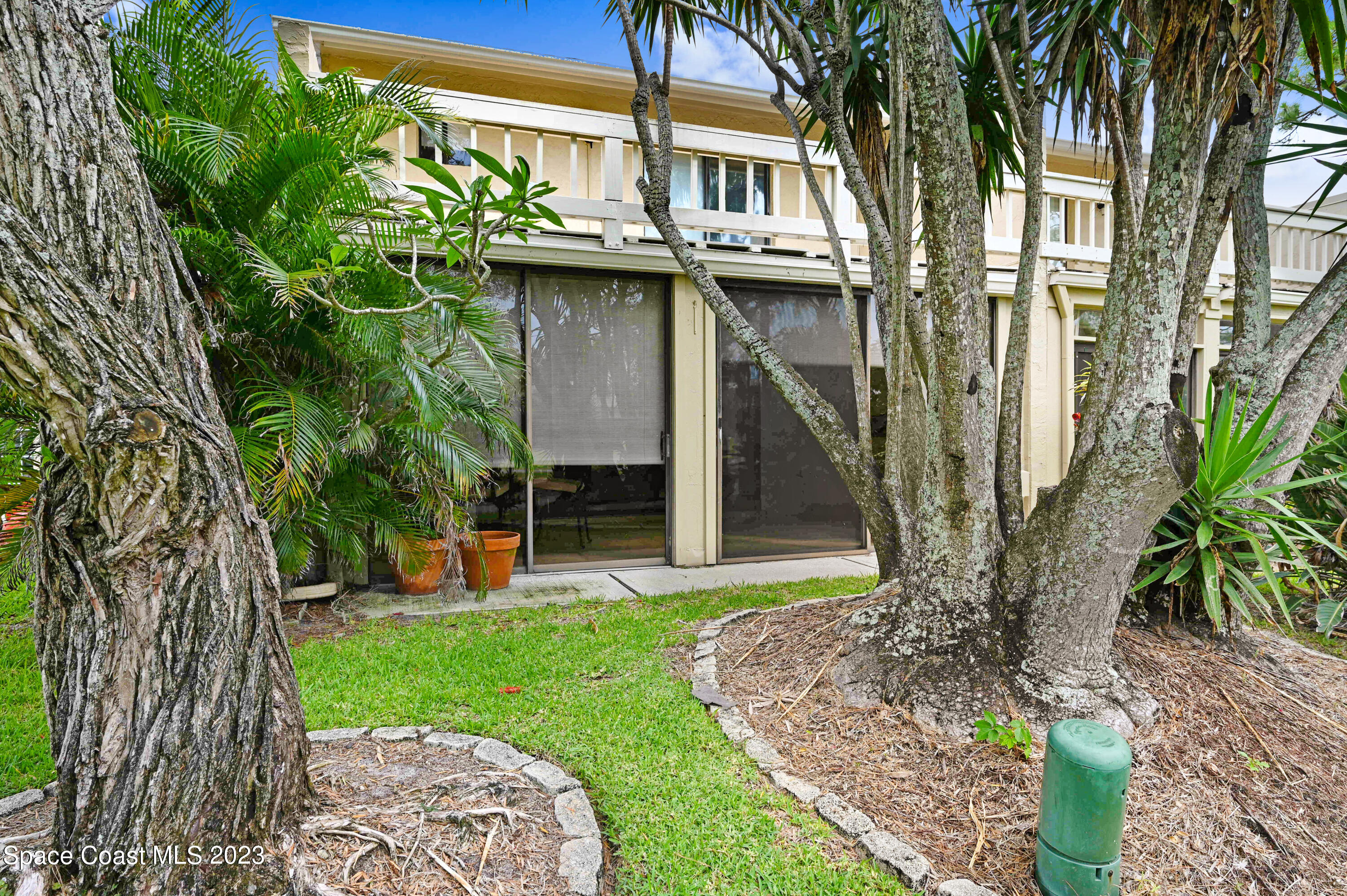229 Augusta Way Melbourne, FL 32940 - Photo 30 of 39 a view of a house with a yard