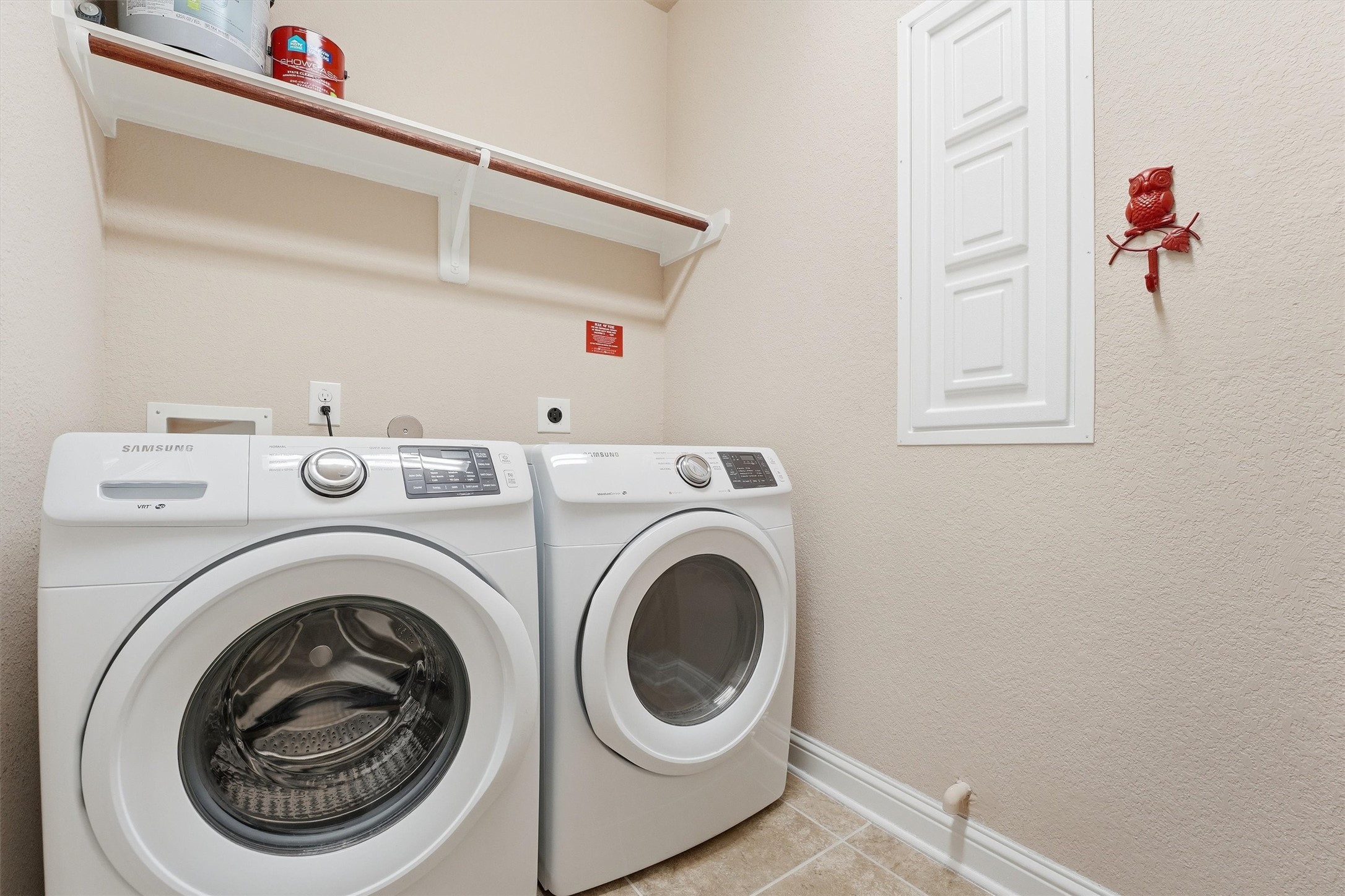 1911 Cedar Ridge Lane Pearland, TX 77089 - Photo 22 of 33 Laundry room inside the home with space for folding or extra appliances.