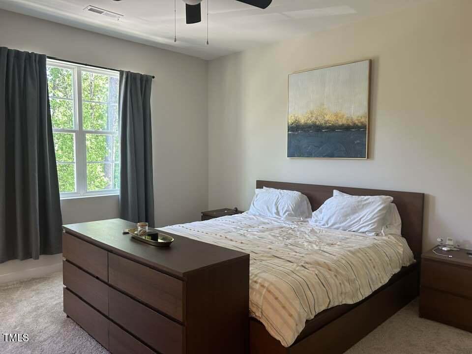 816 Laurel Gate Drive Wake Forest, NC 27587 - Photo 12 of 20 a bedroom with a bed and window